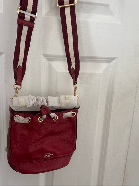 Coach Handbags - Coach Red Pebbled Leather Drawstring Crossbody with Striped Strap